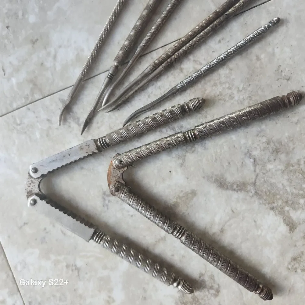 Silver metal Vintage Embossed Nutcracker & Six Picks set